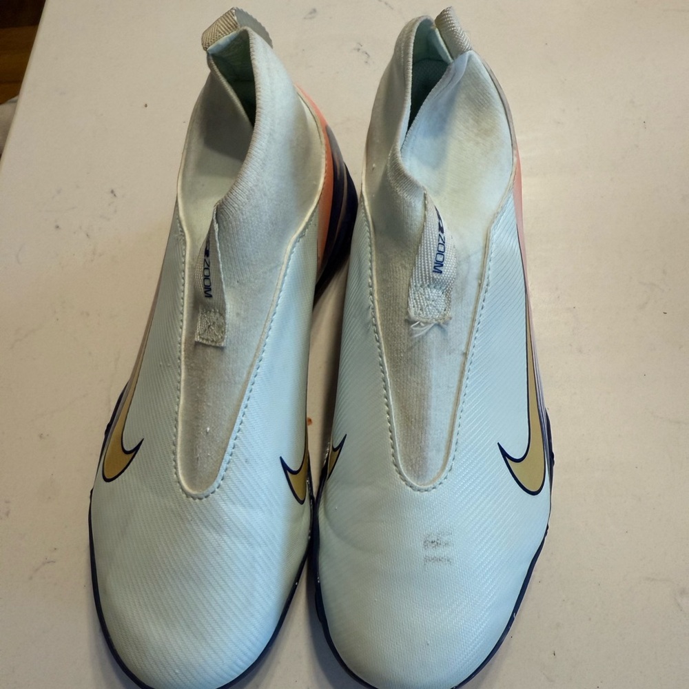 Nike Soccer Cleats in White and Gold Accents